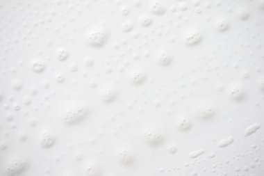 Arka plan beyaz sabunlu köpük doku. Şampuan köpük ile 