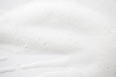 Arka plan beyaz sabunlu köpük doku. Şampuan köpük ile 