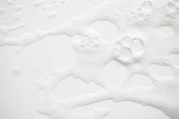 Abstract background white soapy foam texture. Shampoo foam with — Stock Photo, Image