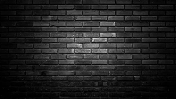 black brick wall of dark stone texture, gloomy background