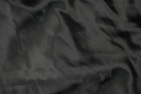 Текстура фону чорної тканини — стокове фото