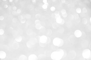 Bokeh 'te noel arkaplanı deseni soyut ışık parıldayan yıldızlar. simli klasik ışık arkaplanı