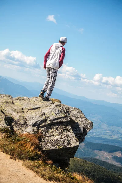 Man Standing Alone At The Mountain