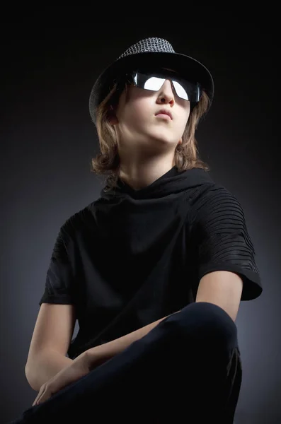 Portrait of a Boy with Blond Hair in Hat and Black Top. — Stock Photo, Image