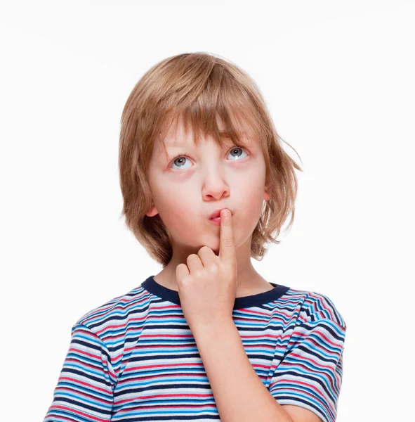 Chłopiec Patrząc Myśląc Palec Ustach Izolowany Białym — Zdjęcie stockowe