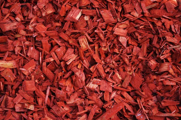 Red natural wood chips mulch pattern background — Stock Photo, Image