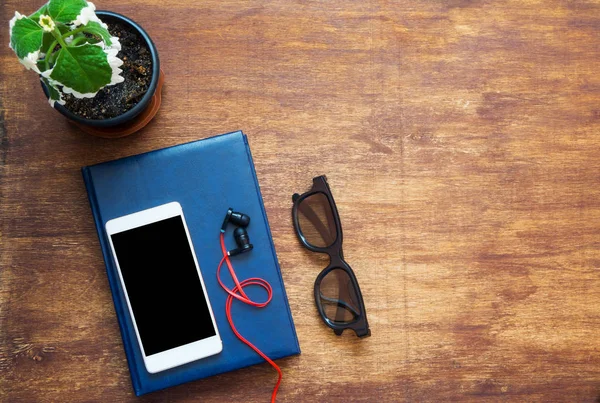 Notebook Cellphone Headphones Black Glasses Wooden Desk Black Blank Space — Stock Photo, Image