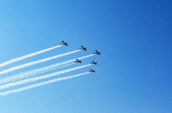 Six airplanes on airshow. Aerobatics Flying Display