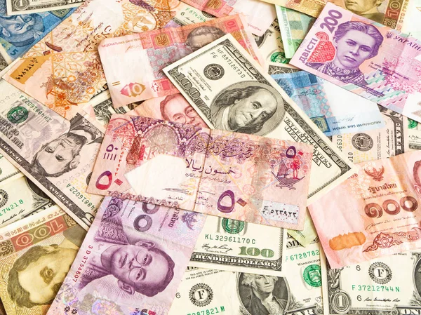 Background from paper money of the different countries. Global currency — Stock Photo, Image