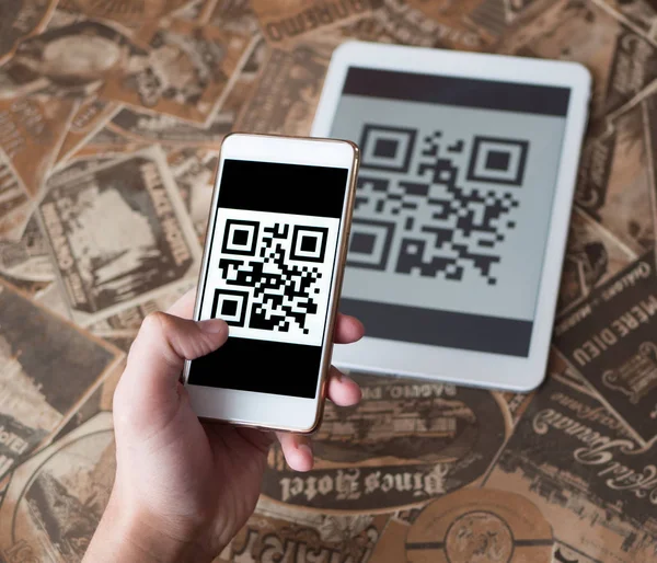 Scanning qr code from the tablet. Cashless purchase