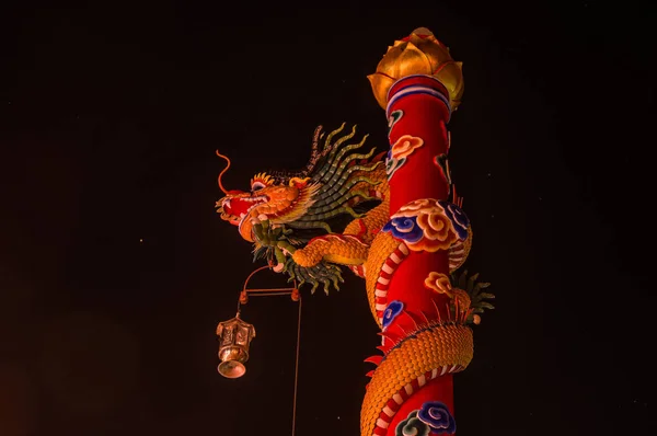 Chinese New Year Dragon Decoration on the column at night — Stock Photo, Image