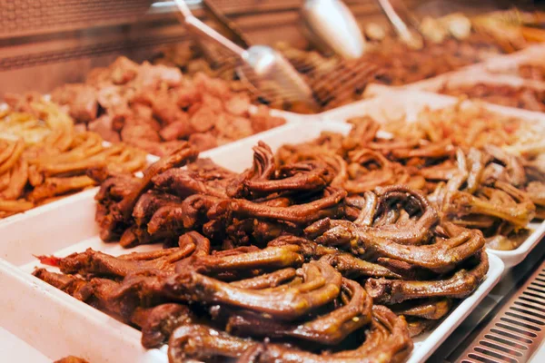 Chengdu Marinated Spicy Street Food Stall Selling Meat, Vegetables and Inner Animal Parts. Pick and Mix with Duck Wings and Chicken Feet.