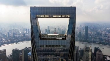 CHINA, SHANGHAI - AUGUST 4, 2018. Frame Of Shanghai Skyline. Oriental Pearl Tower Through Shanghai World Financial Center. clipart