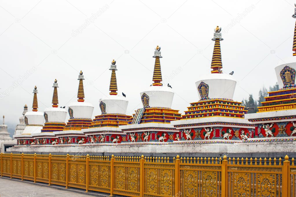Tibetan Religious Elements Of Chorten. Serious Of Colourful Stupa In Kumbum Monastery in Xining, China.