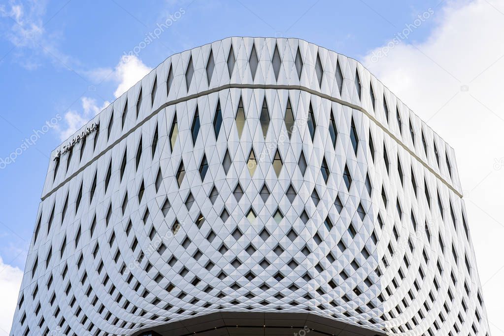 Building Made From Stretched White Tile.