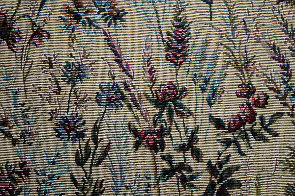 Vintage tapestry background close-up of flowers in garden.  Texture Background.  Woven designs.