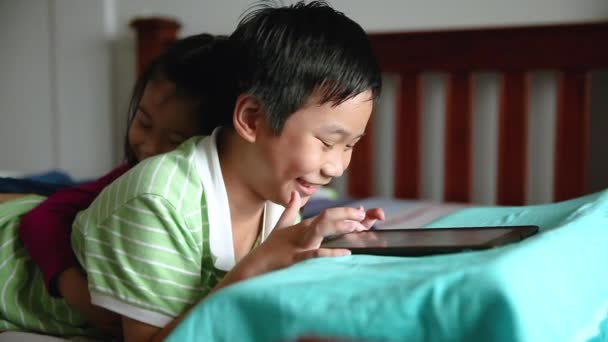 Asian Children Using Digital Tablet Happily Sister Smiling Cheering Her — Stock Video