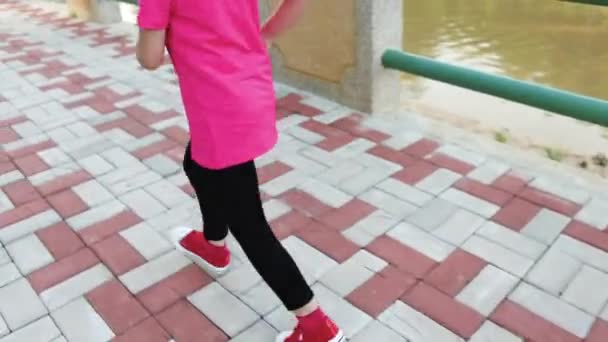 Asian Girl Runner Sportswear Sitting Wearing Her Sport Shoe Jogging — Stock Video