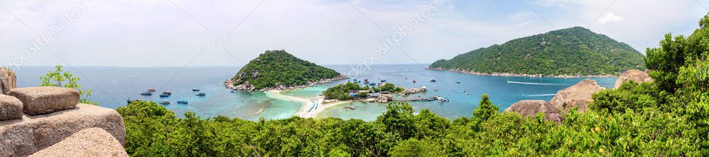 Panorama high angle view beautiful nature landscape sea beach and pier for boat trip at Koh Nang Yuan Island during summer is a famous tourist attraction in the Gulf of Thailand, Surat Thani, Thailand