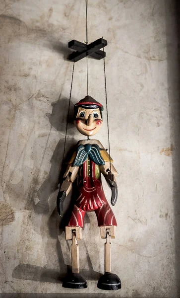 Selective Focus Abstract Image Wooden String Puppet Boy Hanging Wall — Stock Photo, Image
