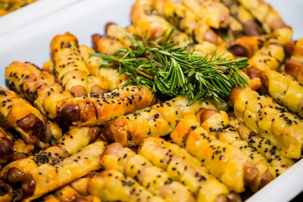 Toad in the Hole sausages in pastry for catering at gala dinner banquet event