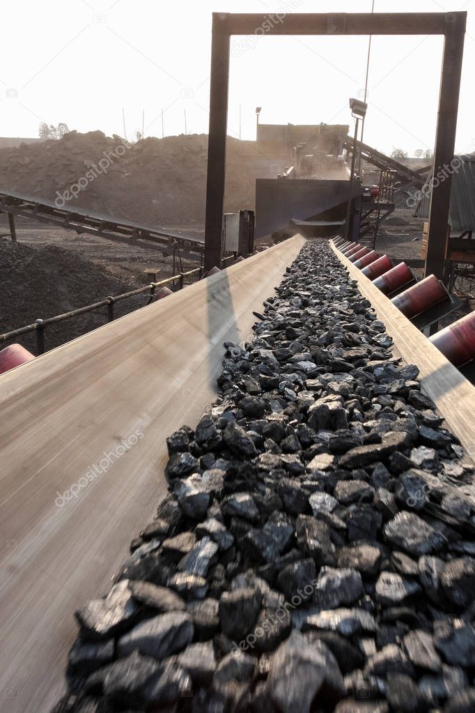 Conveyor belt of coal ore rock for processing and washing on site at coal mine
