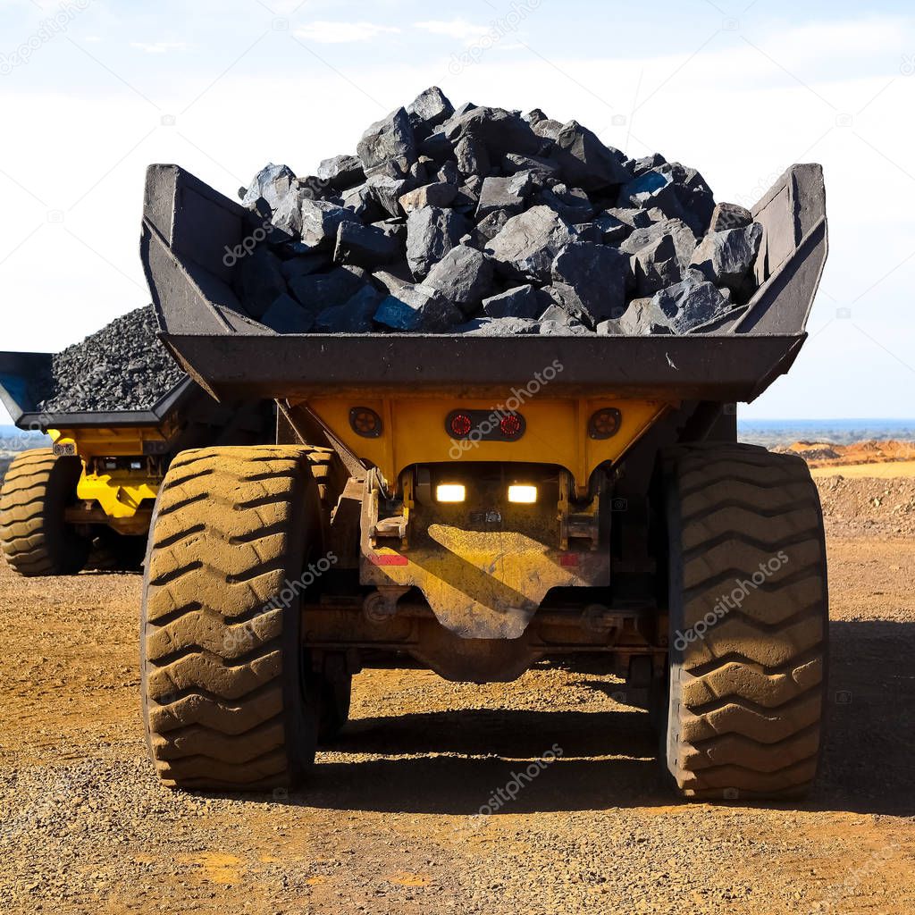Mining Dump Truck transporting Manganese for processing, Manganese Mining and processing in South Afric