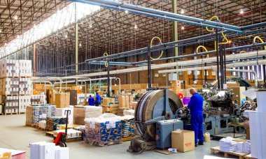 Johannesburg, South Africa - March 23 2011: Inside a Printing and Packaging Factory Facility clipart