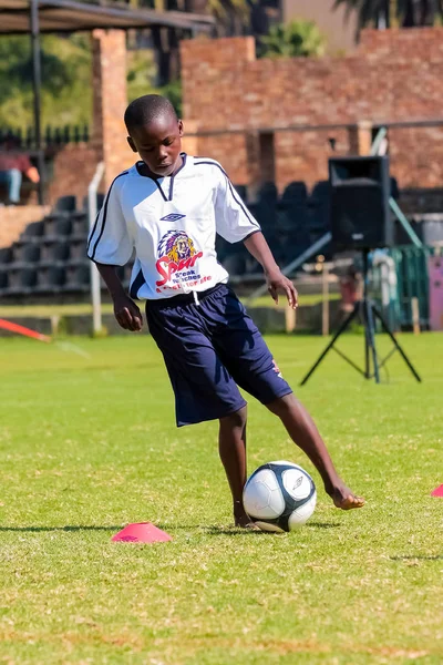 Diverse children playing soccer football at school — Stock Photo, Image