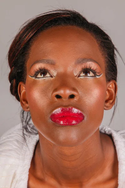 African Model with unusual make-up on her face — Stock Photo, Image