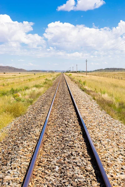 Railway track in countryside rural farmland area of South Africa — Stock Photo, Image