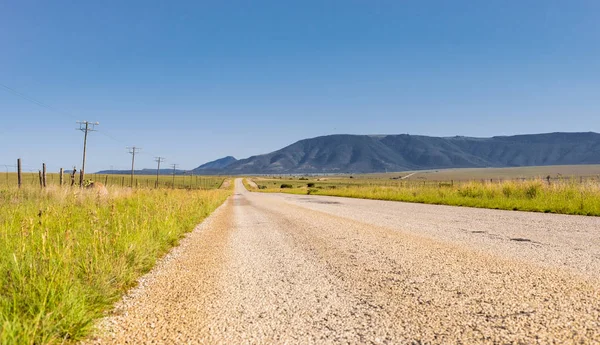 Vista de una carretera rural vacía —  Fotos de Stock