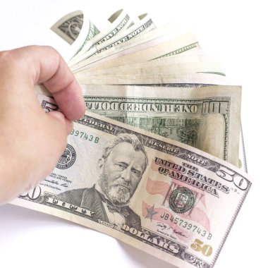 bir kaç dolar bir adam elinde tutuyor