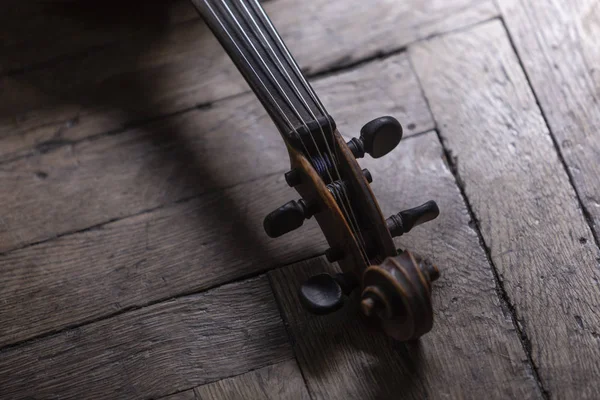 Ein Teil Einer Geige Oder Einer Bratsche Auf Einem Holzgrund — Stockfoto