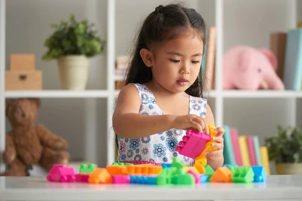 Little Girl Playing Bright Plastic Blocks — Stock Photo, Image