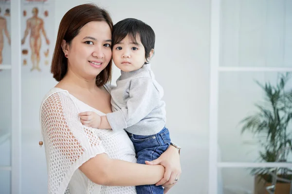 Pretty Asian Woman Holding Cute Little Son Hands — Stock Photo, Image