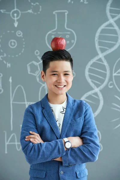 Smiling Asian Pupil Ripe Red Apple Head — Stock Photo, Image