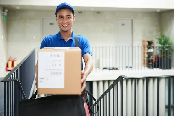 Happy Postman Giving Camera Big Delivery Box — Stock Photo, Image