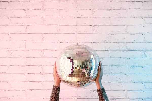 Female Hands Holding Disco Ball White Brick Wall Background Copy — Stock Photo, Image