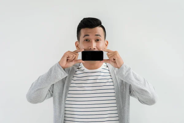 Cheerful Young Mixed Race Man Showing Smartphone Empty Screen — Stock Photo, Image