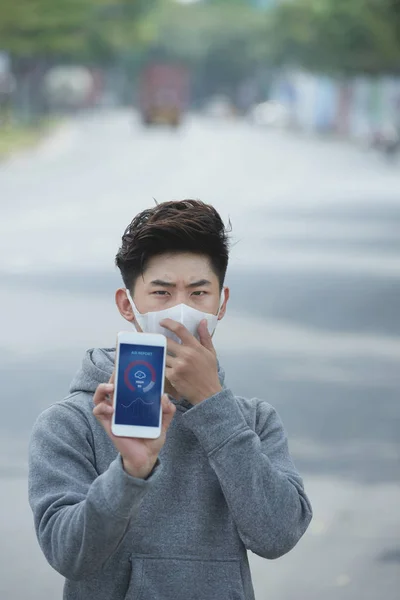 Young Asian Man Mask Showing Air Quality Index Application — Stock Photo, Image