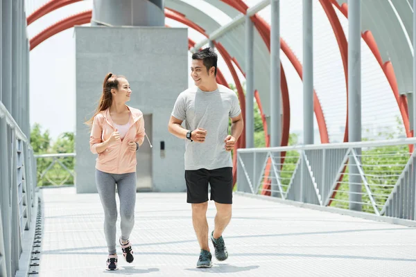 Happy Young Vietnamese Couple Jogging Outdoors — Stock Photo, Image