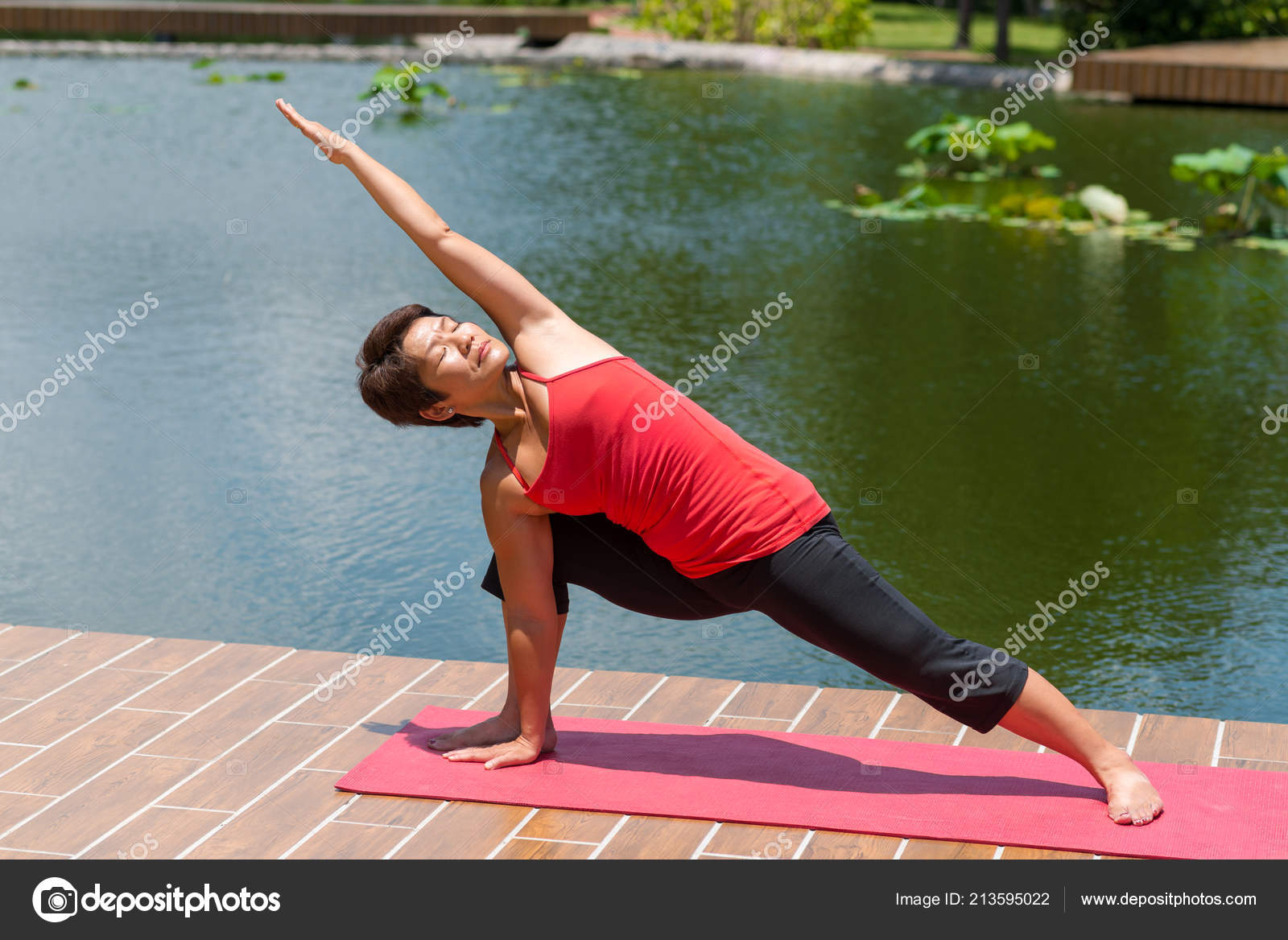 Japanese Mature Woman Enjoying Morning Yoga Outdoors Stock Photo Image By C Dragonimages