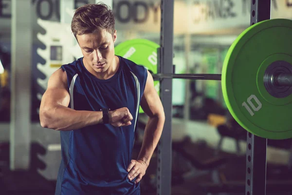 Sporty Man Checking Pulse Smart Watch Exercising — Stock Photo, Image