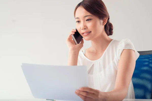 Smiling Pretty Asian Business Woman Calling Mobile Discussing Contract — Stock Photo, Image