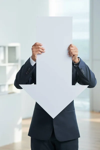 Businessman Holding Arrow While Standing Office Covering Face — Stock Photo, Image