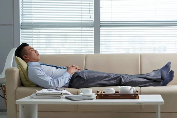 Tired Vietnamese Businessman Sleeping Sofa Office — Stock Photo, Image