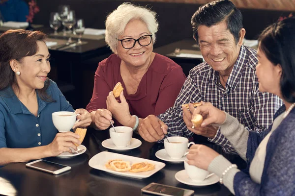 Retired Asian Friends Having Breakfast Cafe Tea Cookies Talking — Stock Photo, Image
