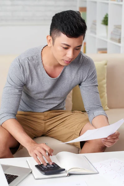Young Asian Businessman Checking Data Financial Report — Stock Photo, Image