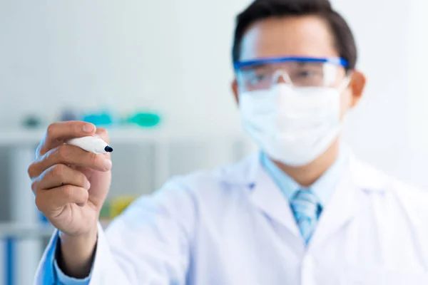Asian Scientist Wearing Safety Goggles White Coat Holding Felt Tip — Stock Photo, Image